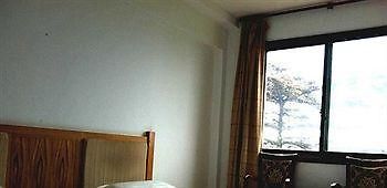 Mount Emei Jindingxiang Huaili Hotel Эмэйшань Экстерьер фото